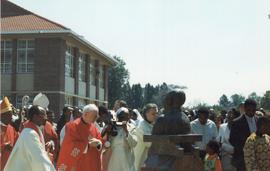 Prayers in front of the Arrupe Statue
